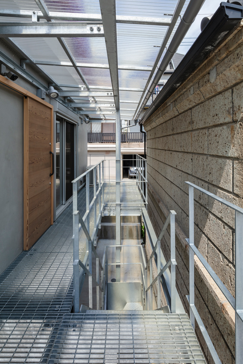 araki + sasaki architects combines three volumes into one residential complex in asaka, japan