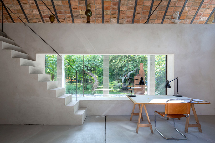 architekti BKPŠ extends family home in slovakia to feature exposed brick ceiling