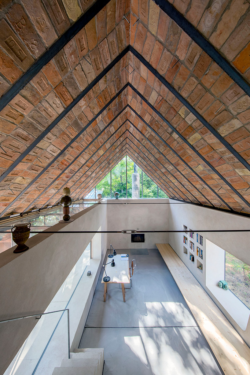 architekti BKPŠ extends family home in slovakia to feature exposed brick ceiling