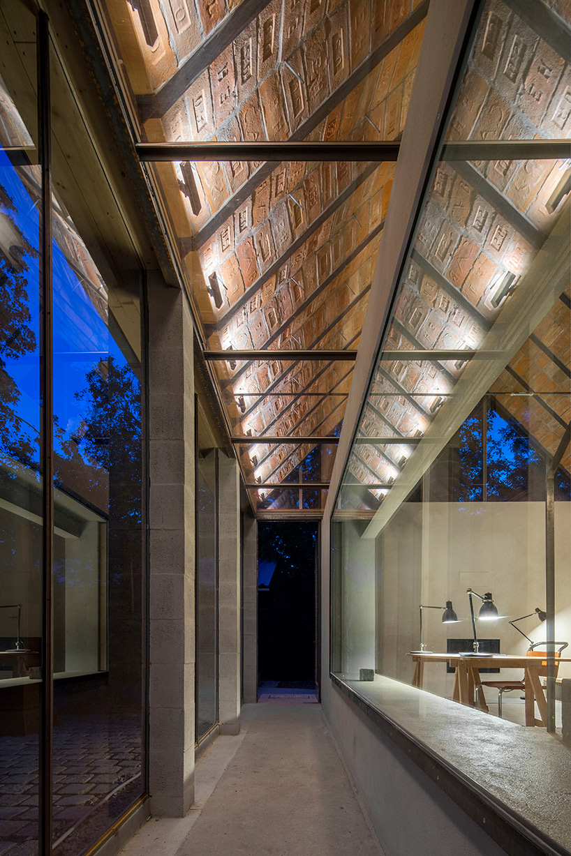 architekti BKPŠ extends family home in slovakia to feature exposed brick ceiling