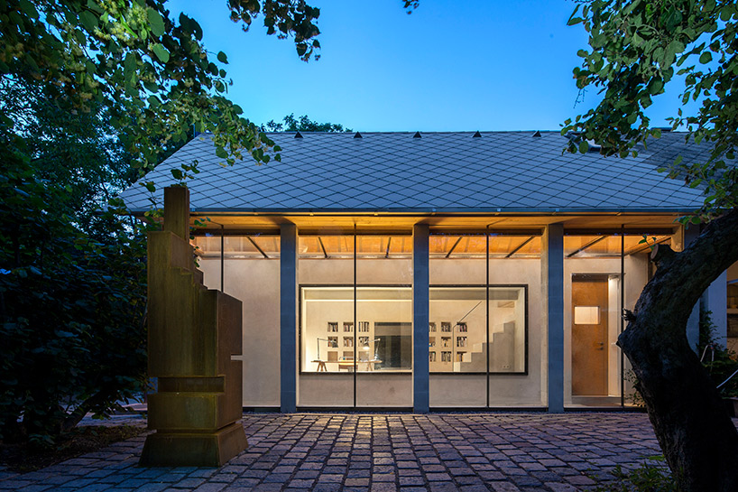 architekti BKPŠ extends family home in slovakia to feature exposed brick ceiling