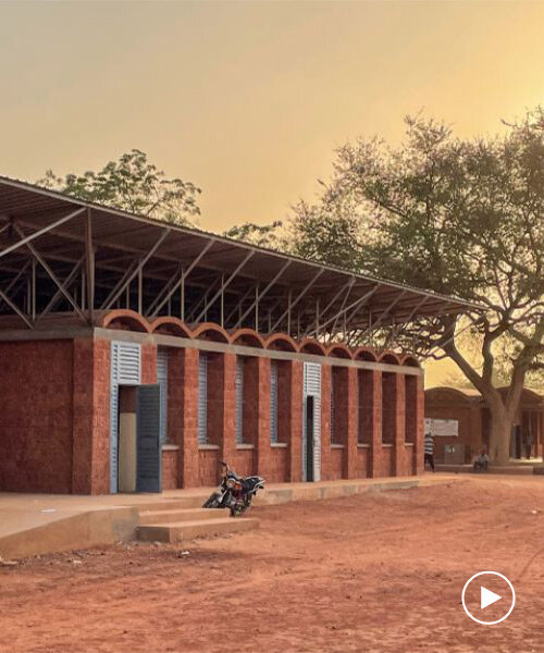 article 25 builds a school in niger using locally sourced laterite stone