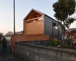 angled wooden louvers secure privacy in atelier thu's house in higashi kakogawa, japan