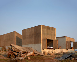 BAAQ' arranges four wood + concrete volumes into 'casa naila' house in oaxaca, mexico