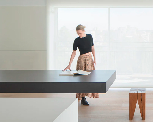 balzar arquitectos renovates alicante apartment with a cantilevered kitchen island 