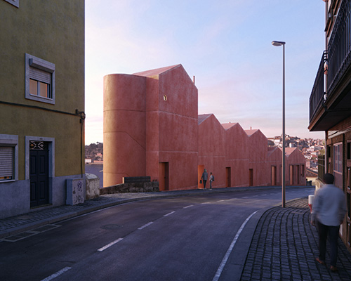 caiano . morgado uses red clay toned concrete to complete housing project in portugal