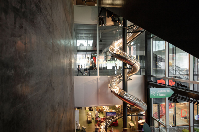 carsten höller installs 40-meter-long slide at the danish architecture center in copenhagen