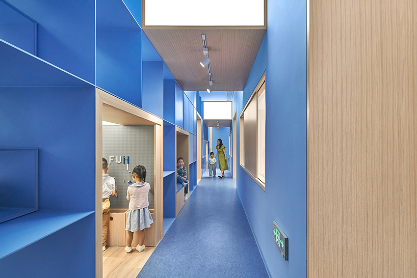 crossboundaries organizes Qkids education space around a 'blue spine'