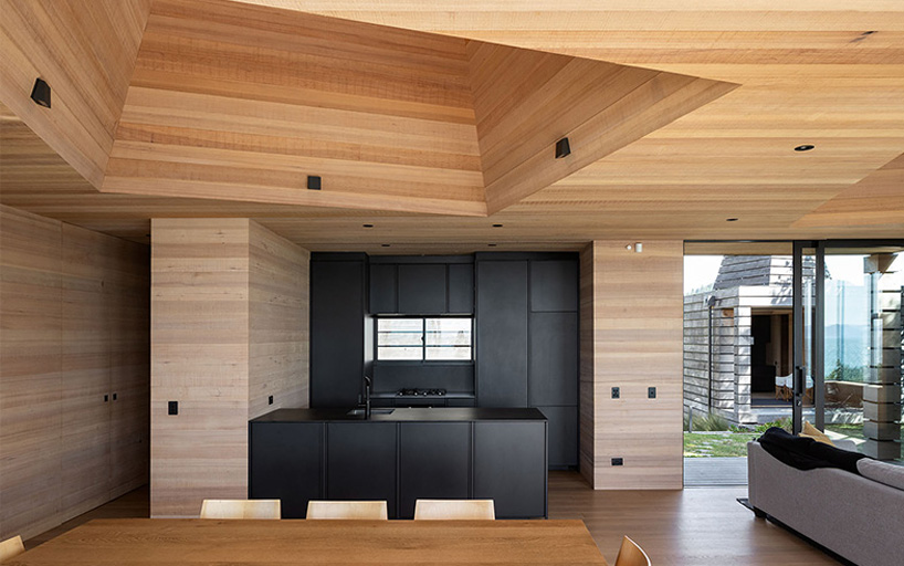 crosson architects tops new zealand house with strategically placed light-wells