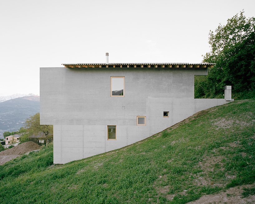 deschenaux follonier's concrete house overlooks 'la place,' switzerland