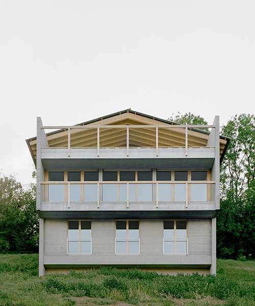 deschenaux follonier's composition of timber and concrete overlooks 'la place'