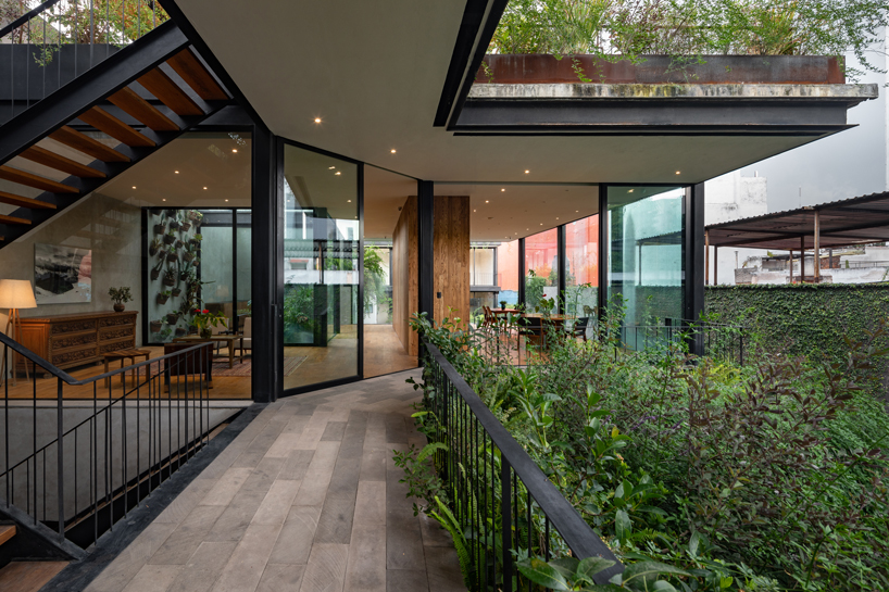 gabriel beas arquitectos converts a 1905 house into a plant-filled office in mexico city 