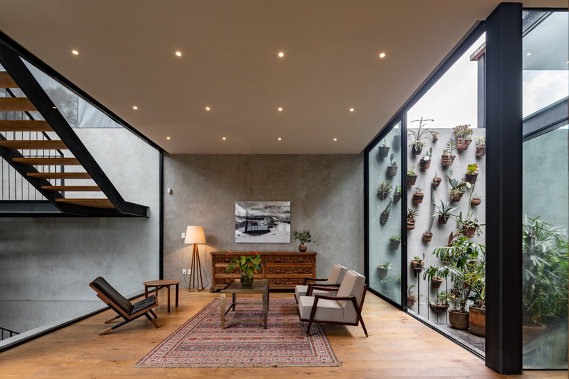 gabriel beas arquitectos converts a 1905 house into a plant-filled office in mexico city 