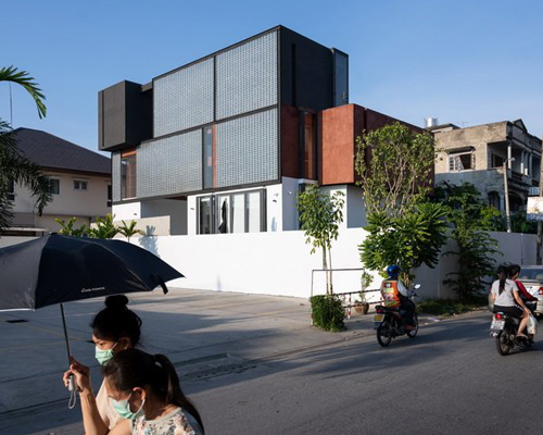 glass block walls bring natural light into archimontage's sena house in bangkok