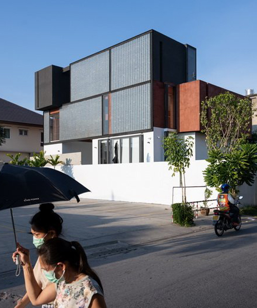 glass block walls bring natural light into archimontage's sena house in bangkok