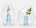 glass flower hoods by yuhsien design studio look like bubbles frozen in time