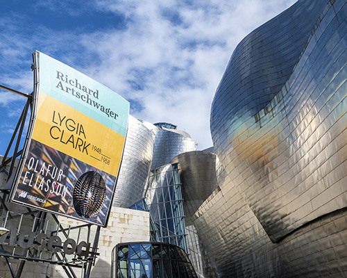 guggenheim museum bilbao installs outdoor banners that help purify the city's air