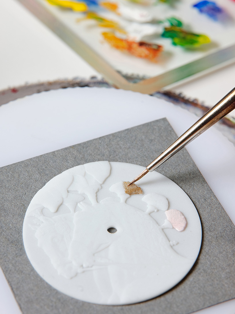 Hermès unveils hand-painted porcelain dial in arceau harnais français watch