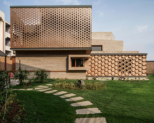 openideas clads its 'hive' with a parametric skin with openings that respond to light exposure