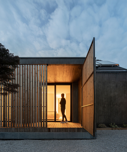 openable timber screens clad house CG by pedro henrique arquiteto in portugal