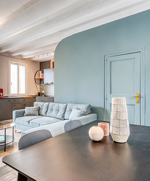insayn design society transforms old apartment into colorful 'cappuccino flat' in barcelona