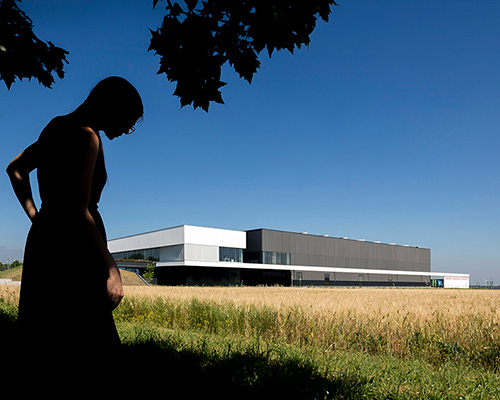 'green factory' by iotti + pavarani settles within cultivated plain in northern italy