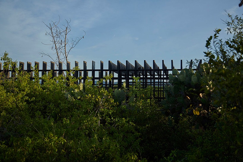 kengo kuma's chicken coop for casa wabi is an interlocking system of charred wooden boards