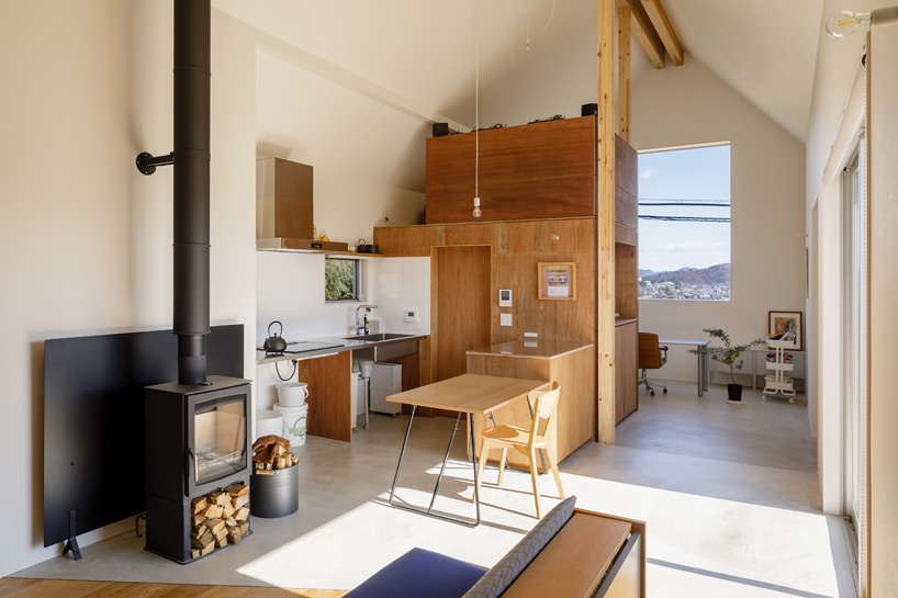 SNARK + OUVI top wooden house in saishikada, japan, with pitched roof