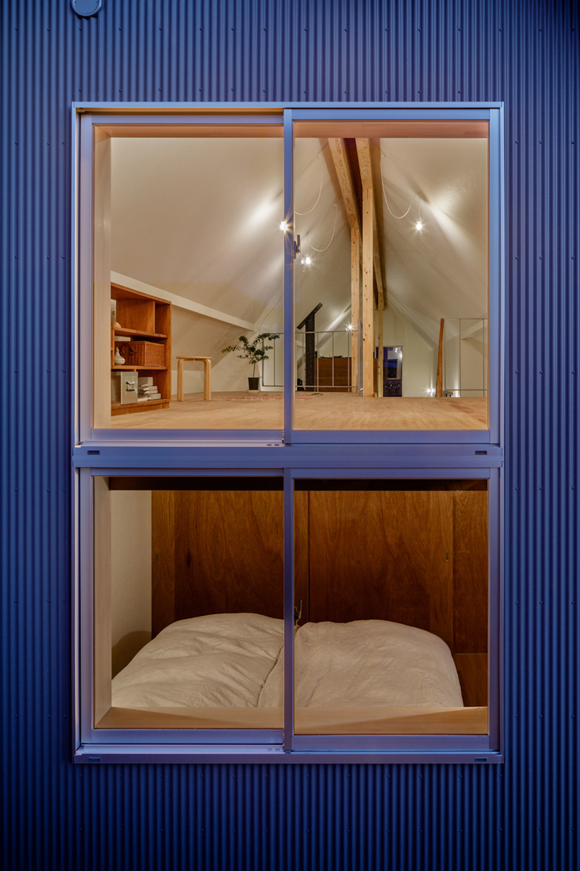 SNARK + OUVI top wooden house in saishikada, japan, with pitched roof