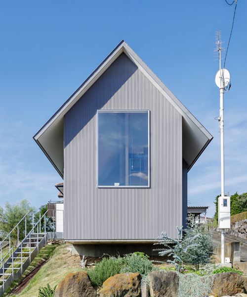 SNARK + OUVI top wooden house in saishikada, japan, with pitched roof
