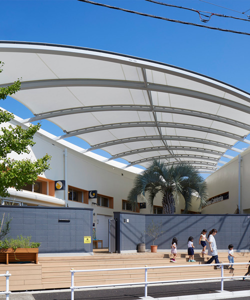 naf architect + design tops 'seiwa' kindergarten arcade with membrane roof in tokyo