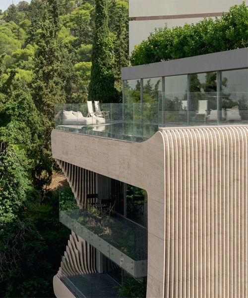 omniview applies organic marble facade to private residence in athens, greece