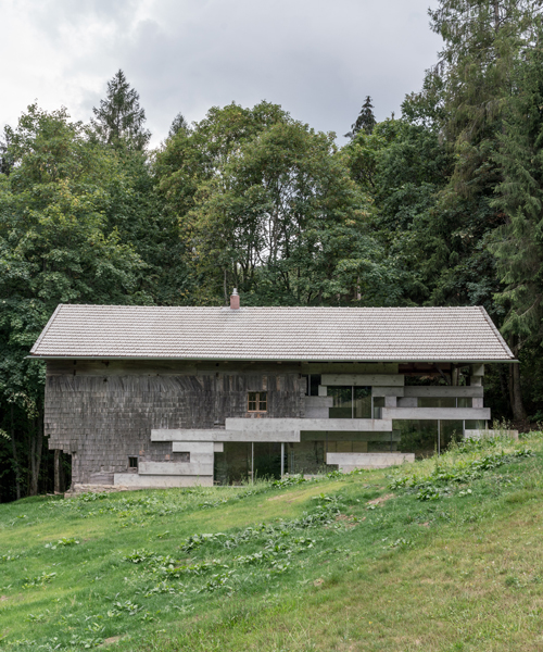 peter haimerl revives a bavarian farmhouse with glass and concrete insertions