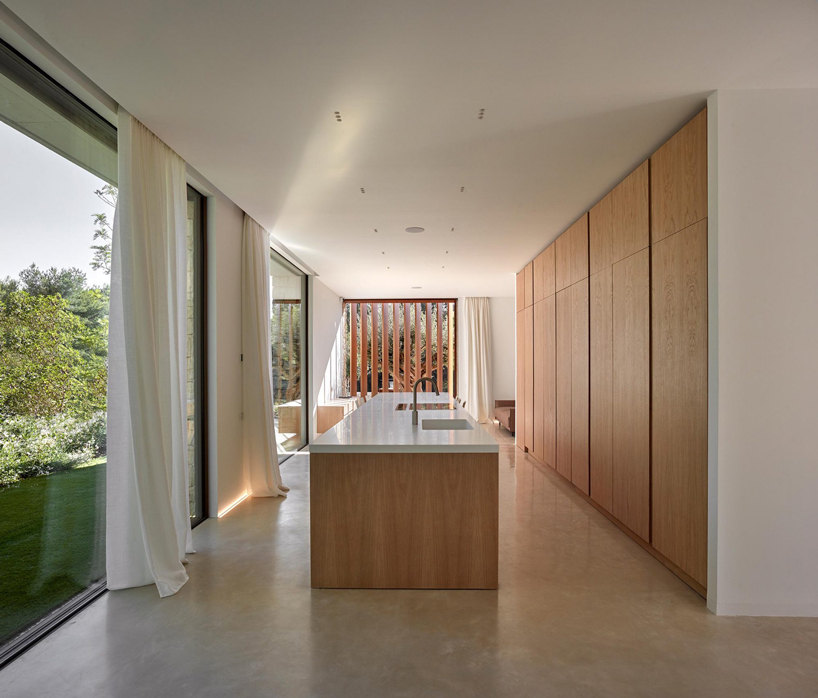 a large central atrium perforates ramón esteve's house in la cañada, valencia