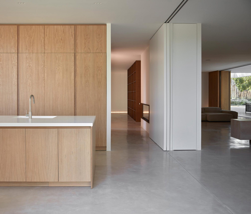 a large central atrium perforates ramón esteve's house in la cañada, valencia
