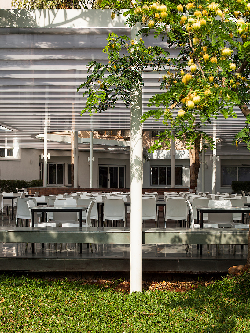 sP+a connects campus in mumbai with dining pavilion that weaves between the trees