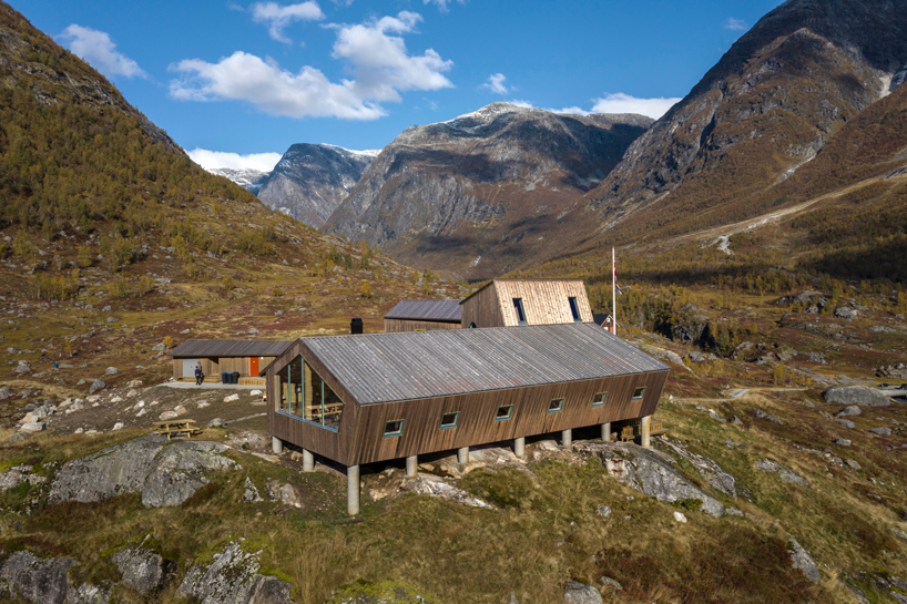 snøhetta builds pentagonal hiking cabins to overlook a glacier in norway