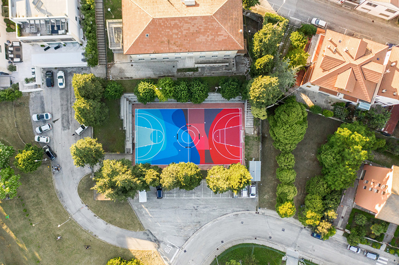 street artist giulio vesprini regenerates playground in italy with vibrant colors