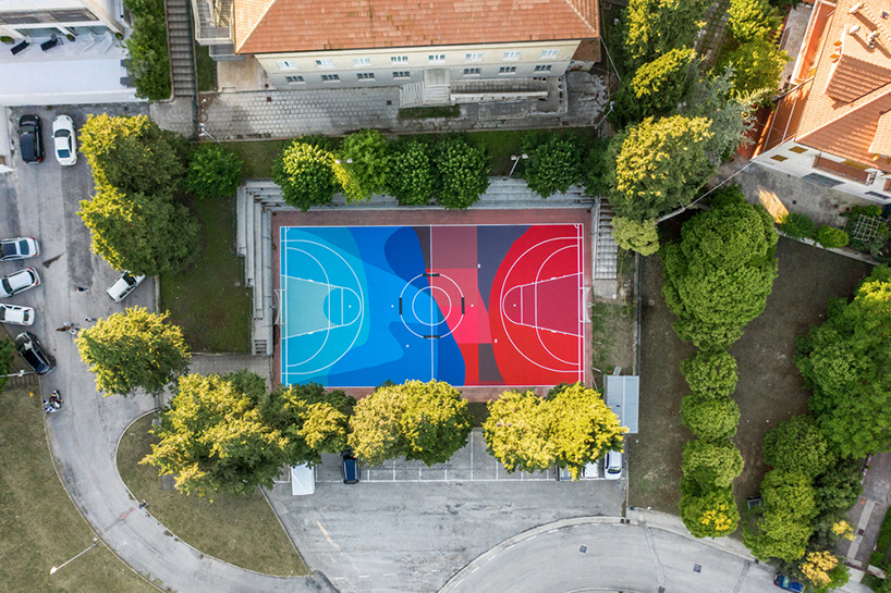 street artist giulio vesprini regenerates playground in italy with vibrant colors