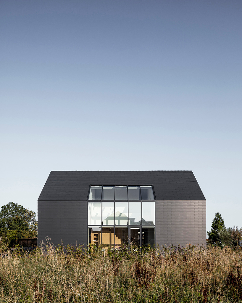 studio AAAN designs house zevenhuizen as a 'pure black sculpture' in the netherlands