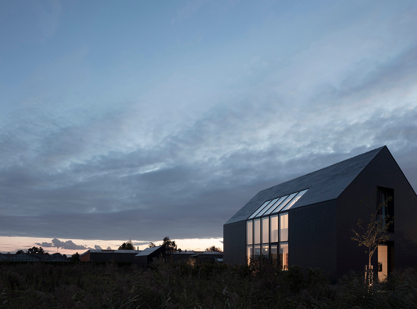 studio AAAN designs house zevenhuizen as a 'pure black sculpture' in the netherlands