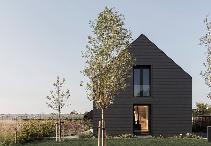 studio AAAN designs house zevenhuizen as a 'pure black sculpture' in the netherlands