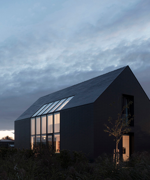 studio AAAN designs house zevenhuizen as a 'pure black sculpture' in the netherlands