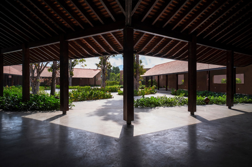 steep-slope roofs top the volumes of TAA design's 'phu my garden' park in vietnam