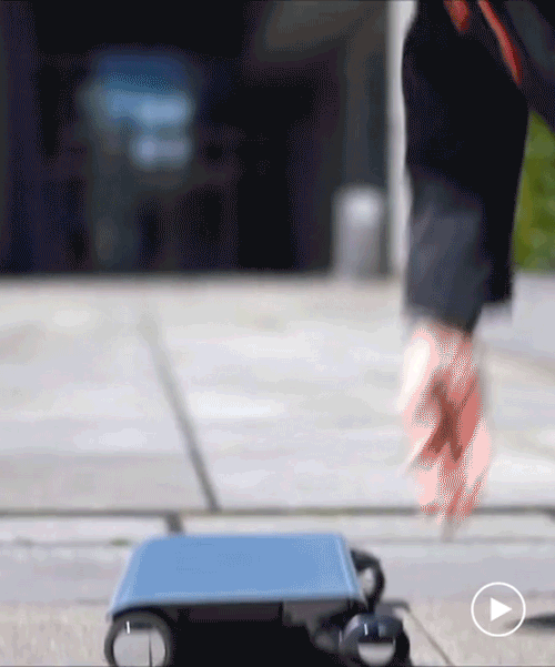 'walkcar' by cocoa motors is a portable vehicle you can carry around like a laptop