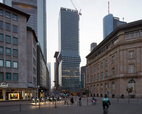 bjarke ingels group's shifting 'omniturm' tower in frankfurt nears completion
