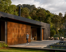 PPAA designs 'las golondrinas' house as a composition of matte black and timber geometries