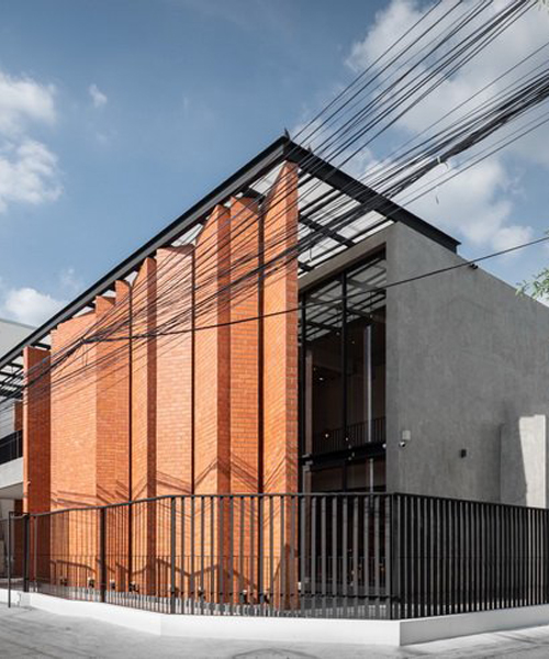 overlapping strips of terracotta tiles shade archimontage's pakkret house in thailand