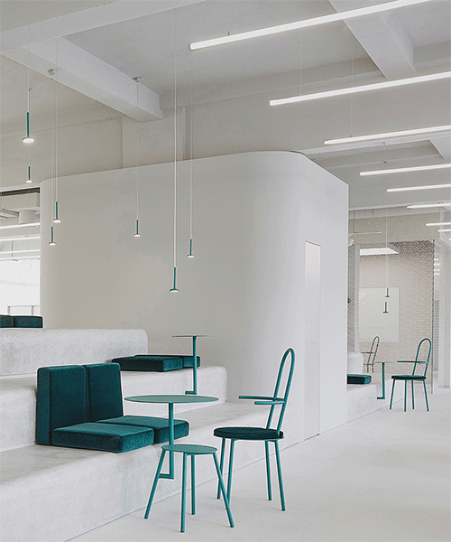 colored furniture pop through minimal interior of esprit's new headquarters in shanghai