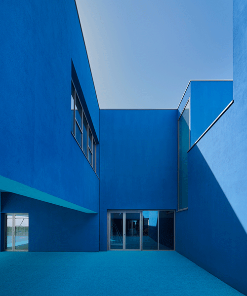 dominique coulon applies varying shades of blue to school group 'rené beauverie' in france